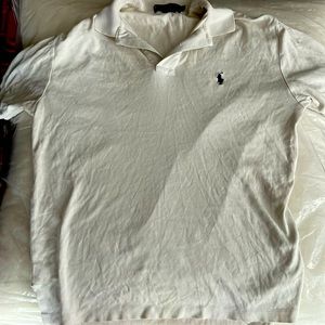 Another awesome polo shirt. It is white and by Ralph Lauren.